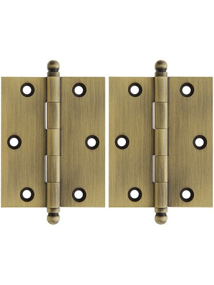 Premium Solid Brass Ball-Tip Cabinet Hinges Pair - 2 1/2 inch by 2 inch in Antique Brass.